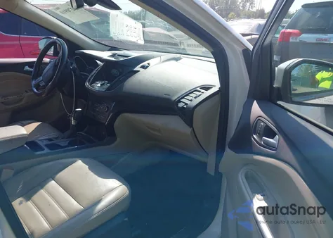 2017 Ford Escape Titanium z USA, uszkodzony, nr VIN 1FMCU9J94HUC20180